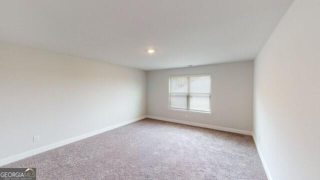 3402 Milan Ct Lot 1Plapprox Sqft 2, Douglasville, GA 30135 - carpeted empty room with baseboards