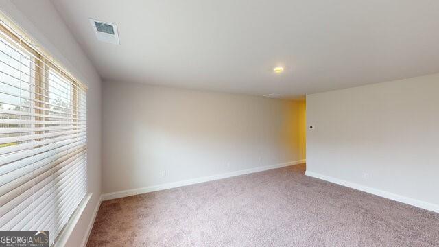 3402 Milan Ct Lot 1Plapprox Sqft 2, Douglasville, GA 30135 - carpeted spare room with baseboards