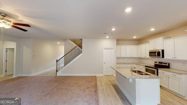 3402 Milan Ct Lot 1Plapprox Sqft 2, Douglasville, GA 30135 - kitchen featuring appliances with stainless steel finishes, a ceiling fan, a center island with sink, white cabinetry, and recessed lighting
