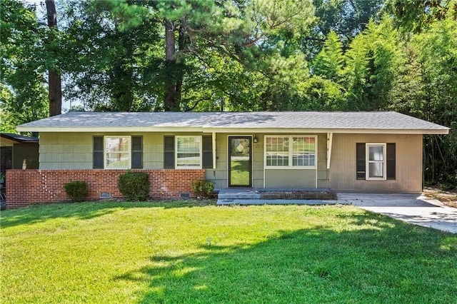 single story home with a porch and a front lawn