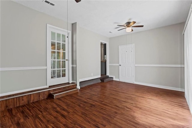 spare room featuring ceiling fan and hardwood / wood-style flooring