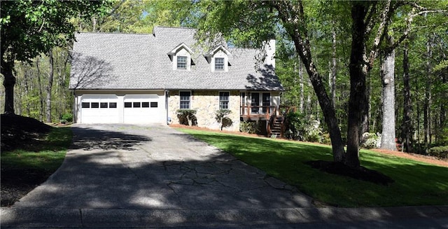 1521 Larkwood Dr, Canton, GA 30114 - cape cod home with driveway, a front yard, stone siding, and stairway