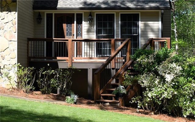 1521 Larkwood Dr, Canton, GA 30114 - back of property featuring stairway, stone siding, and roof with shingles