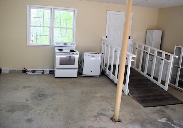 1521 Larkwood Dr, Canton, GA 30114 - kitchen featuring white range with electric stovetop and unfinished concrete flooring