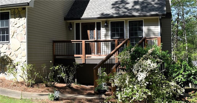 1521 Larkwood Dr, Canton, GA 30114 - property entrance with stone siding and a shingled roof
