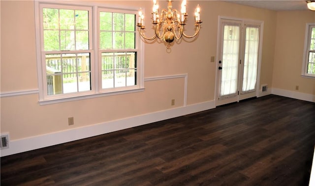 1521 Larkwood Dr, Canton, GA 30114 - unfurnished dining area with visible vents, baseboards, an inviting chandelier, and dark wood finished floors