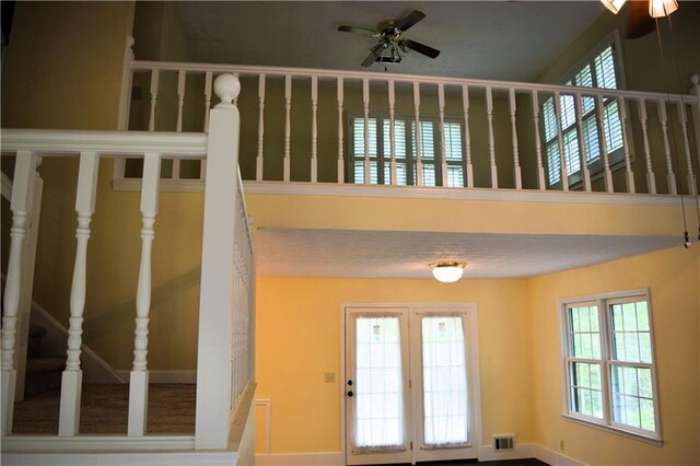 1521 Larkwood Dr, Canton, GA 30114 - stairway with visible vents, ceiling fan, and baseboards