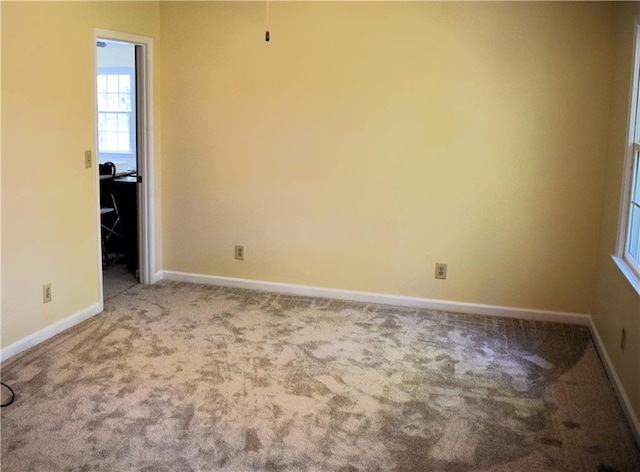 1521 Larkwood Dr, Canton, GA 30114 - carpeted spare room featuring baseboards