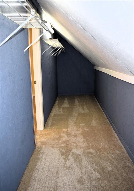 1521 Larkwood Dr, Canton, GA 30114 - additional living space featuring light colored carpet and lofted ceiling