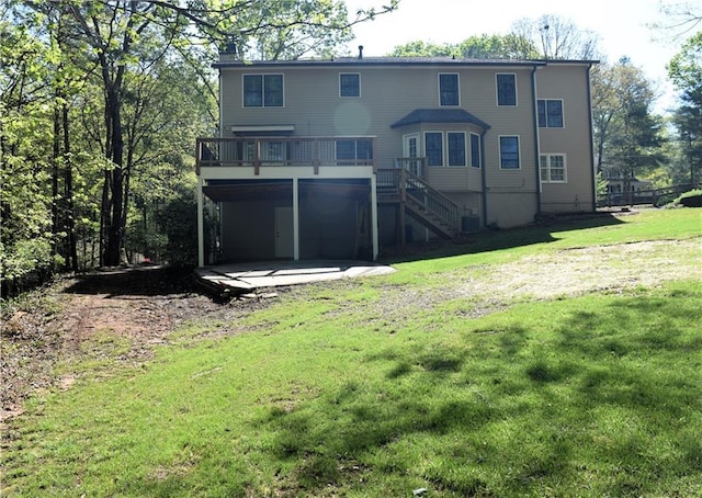 1521 Larkwood Dr, Canton, GA 30114 - back of house with dirt driveway, stairway, a lawn, a patio, and a deck