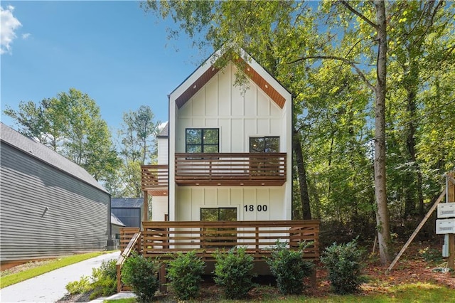 back of property featuring a balcony