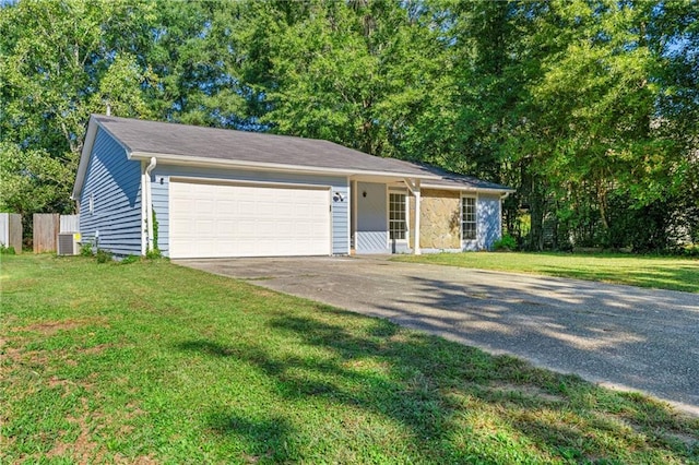 ranch-style house with a garage, cooling unit, and a front lawn