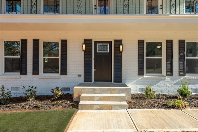 property entrance featuring covered porch