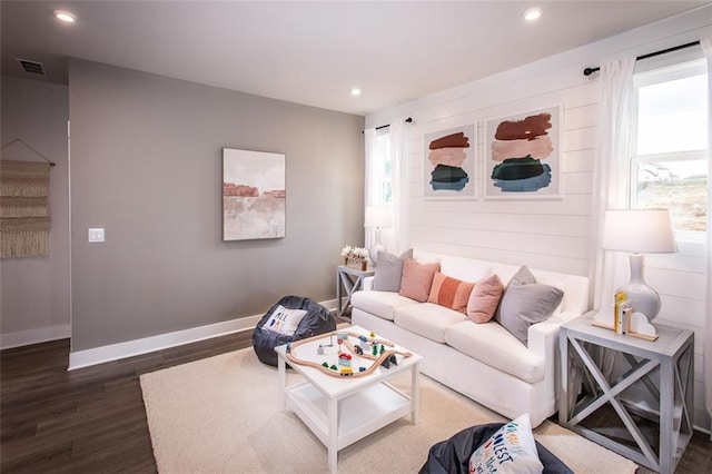 living room with dark wood-type flooring