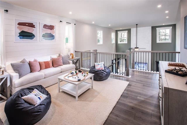 living room with hardwood / wood-style flooring and a wealth of natural light