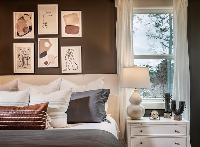 bedroom featuring multiple windows