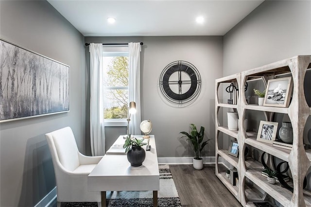 office with dark hardwood / wood-style floors