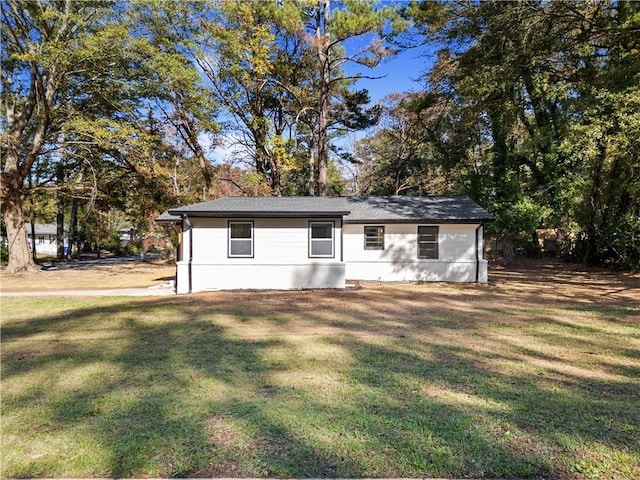 exterior space with a front yard