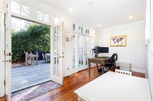 office area featuring visible vents, crown molding, recessed lighting, french doors, and wood finished floors