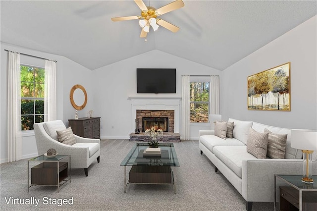 305 Bridgewater Ter, Canton, GA 30115 - living area featuring vaulted ceiling, a ceiling fan, plenty of natural light, carpet flooring, and a fireplace
