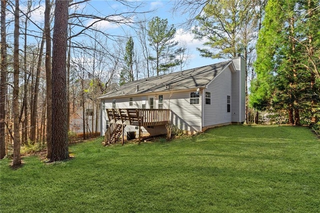 305 Bridgewater Ter, Canton, GA 30115 - rear view of house with a wooden deck, a chimney, stairway, and a lawn