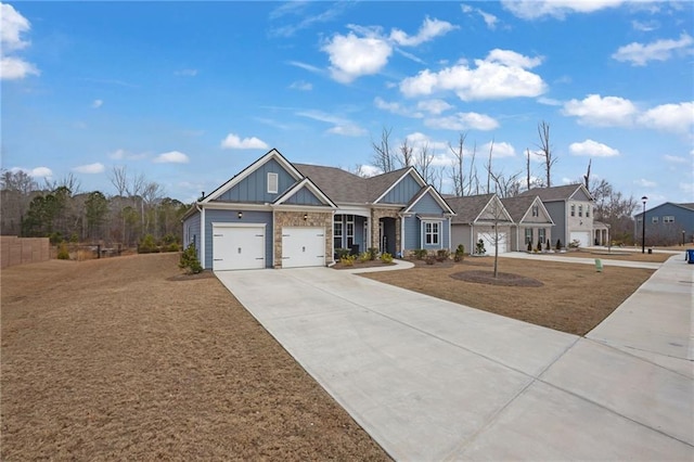 view of front of property with a garage and a front yard