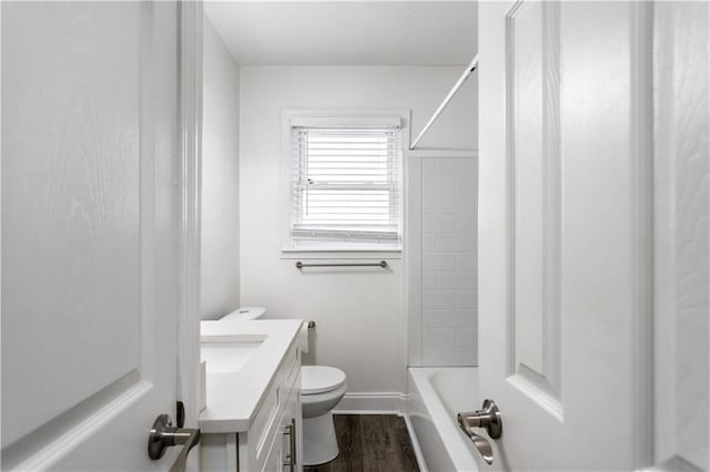1380 Westmont Rd SW, Atlanta, GA 30311 - bathroom with toilet, vanity, baseboards, and wood finished floors
