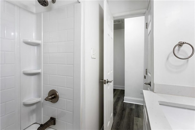 1380 Westmont Rd SW, Atlanta, GA 30311 - bathroom featuring baseboards, wood finished floors, and walk in shower