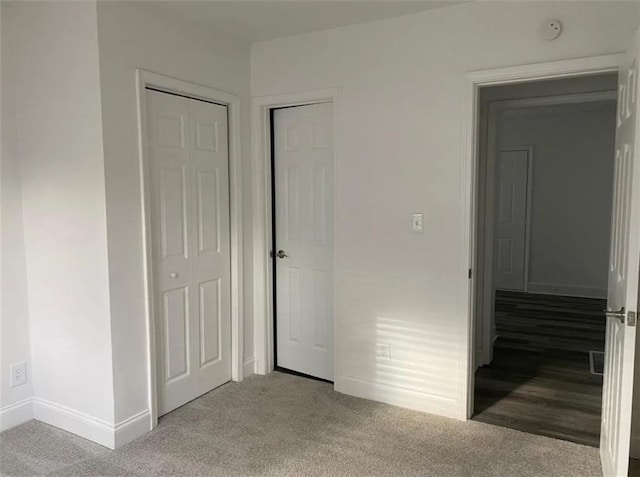 1380 Westmont Rd SW, Atlanta, GA 30311 - unfurnished bedroom with a closet, carpet, and baseboards
