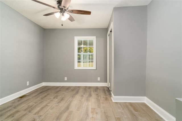 1912 Wax Rd, Aragon, GA 30113 - spare room featuring a ceiling fan, light wood finished floors, and baseboards