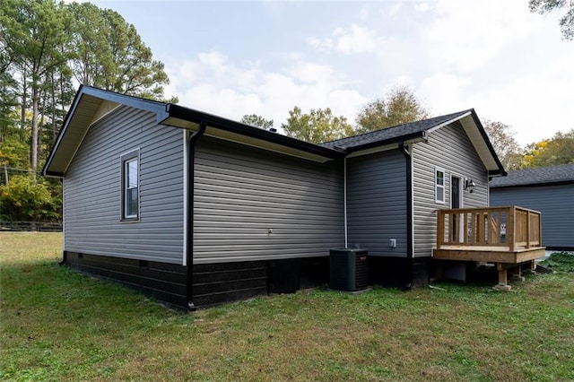 1912 Wax Rd, Aragon, GA 30113 - view of home's exterior featuring central AC, a deck, crawl space, and a yard