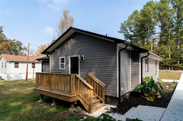 1912 Wax Rd, Aragon, GA 30113 - rear view of property featuring a deck and a yard