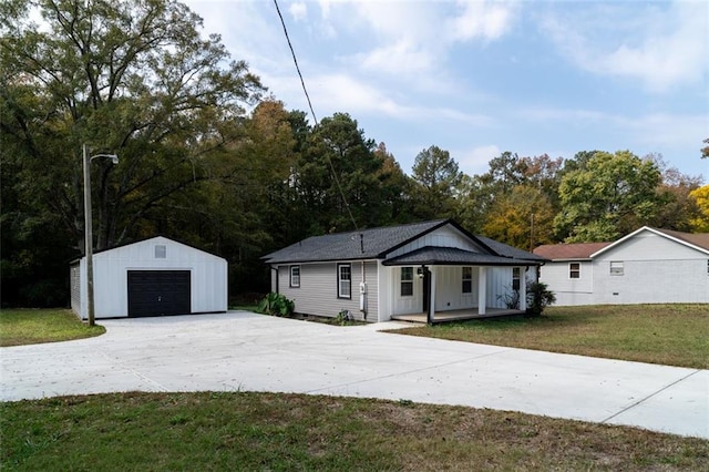 1912 Wax Rd, Aragon, GA 30113 - view of front of house with a garage, an outdoor structure, a front lawn, covered porch, and concrete driveway