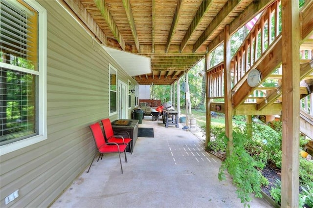 view of patio with a deck