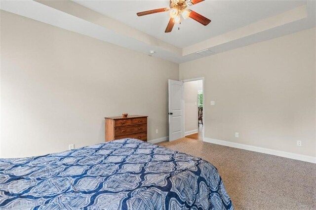 bedroom featuring baseboards, carpet, and a ceiling fan