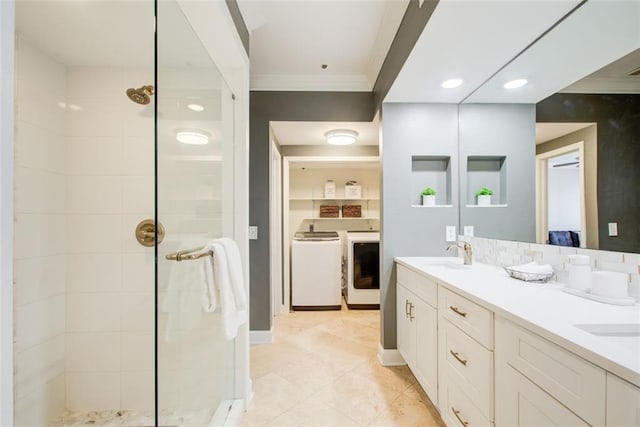 full bathroom featuring a sink, ornamental molding, and walk in shower