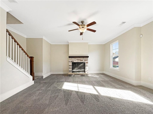 unfurnished living room featuring carpet, ceiling fan, and ornamental molding