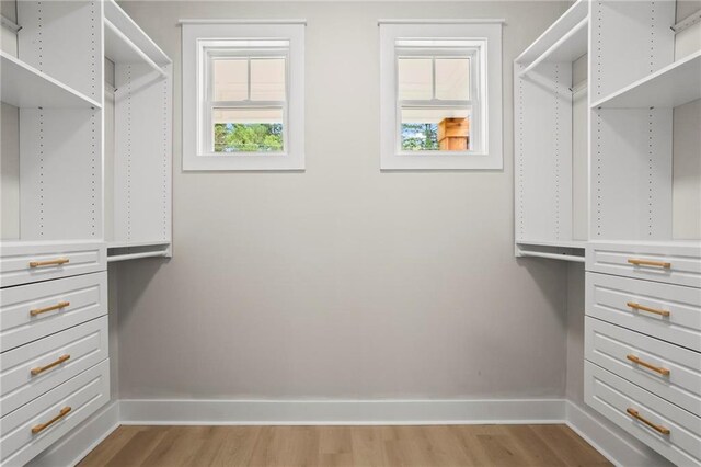 1698 Cunningham Rd SW, Marietta, GA 30008 - walk in closet featuring wood finished floors