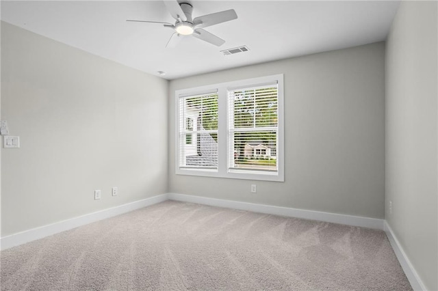 1698 Cunningham Rd SW, Marietta, GA 30008 - empty room featuring light colored carpet, baseboards, and ceiling fan