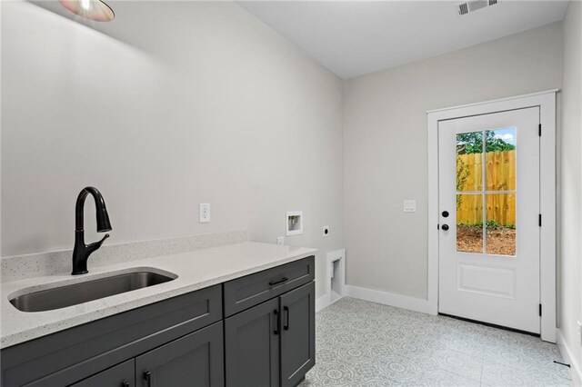 1698 Cunningham Rd SW, Marietta, GA 30008 - washroom with hookup for an electric dryer, cabinet space, washer hookup, and baseboards
