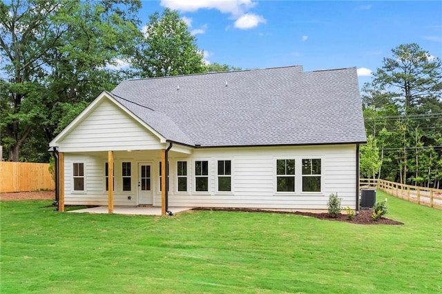 1698 Cunningham Rd SW, Marietta, GA 30008 - rear view of property with central air condition unit, a patio area, and roof with shingles