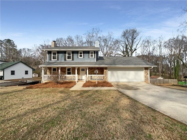 view of front of house with a garage, covered porch, and a front lawn