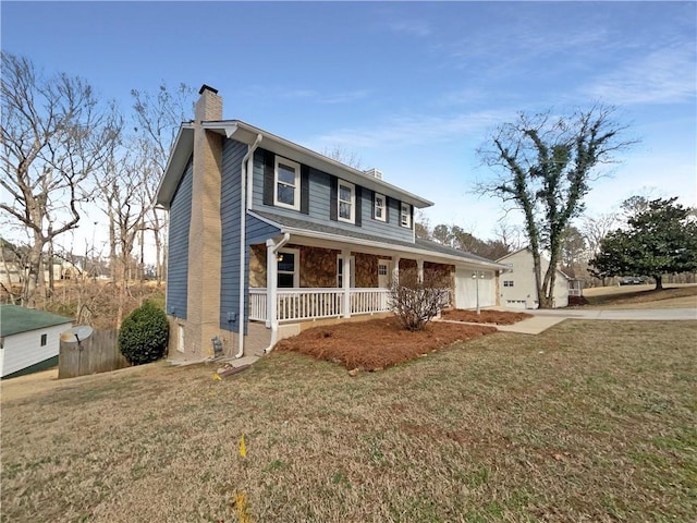 view of front of house with covered porch and a front yard