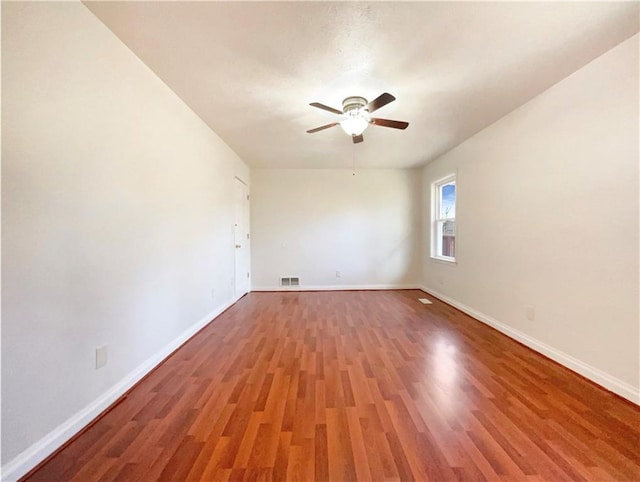 unfurnished room featuring hardwood / wood-style flooring and ceiling fan