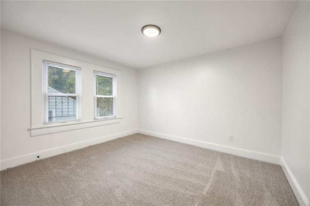 empty room featuring carpet flooring