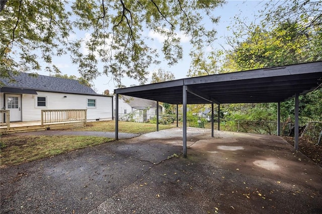 view of parking with a carport