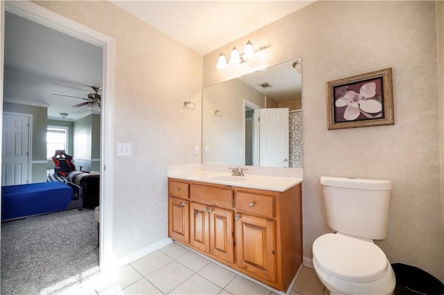 full bath with tile patterned flooring, vanity, toilet, and a ceiling fan