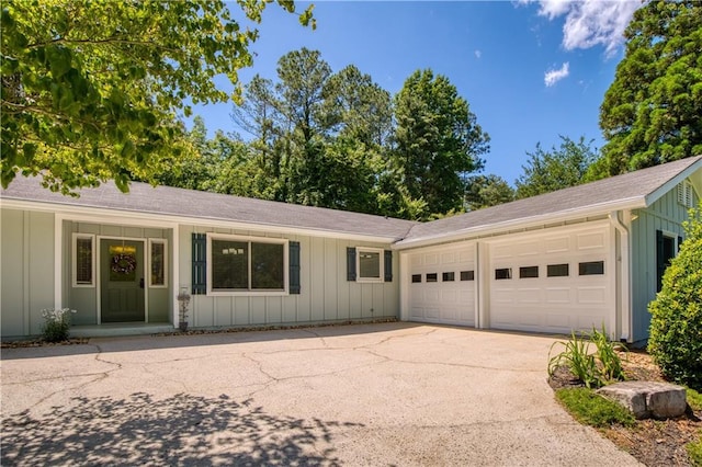 340 Monivea Ln, Roswell, GA 30075 - ranch-style home featuring board and batten siding, a garage, and concrete driveway