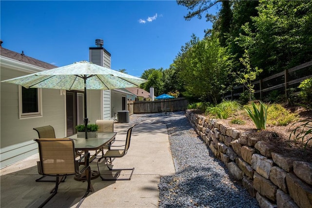 340 Monivea Ln, Roswell, GA 30075 - fenced backyard with outdoor dining space and a patio area