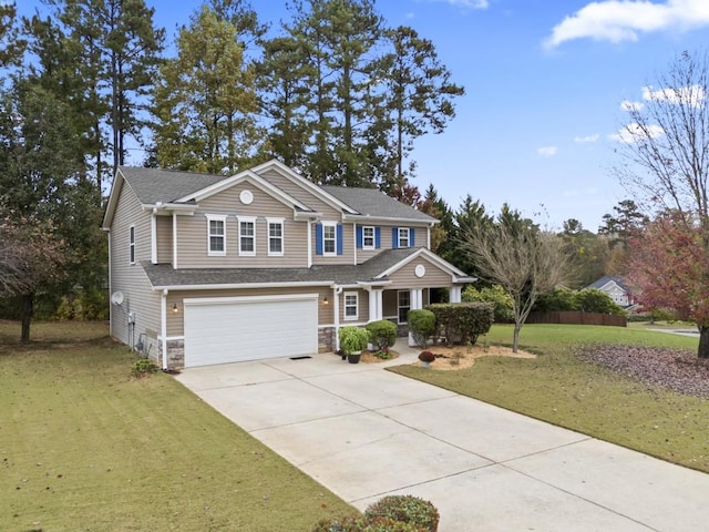 view of front of property with a garage and a front yard